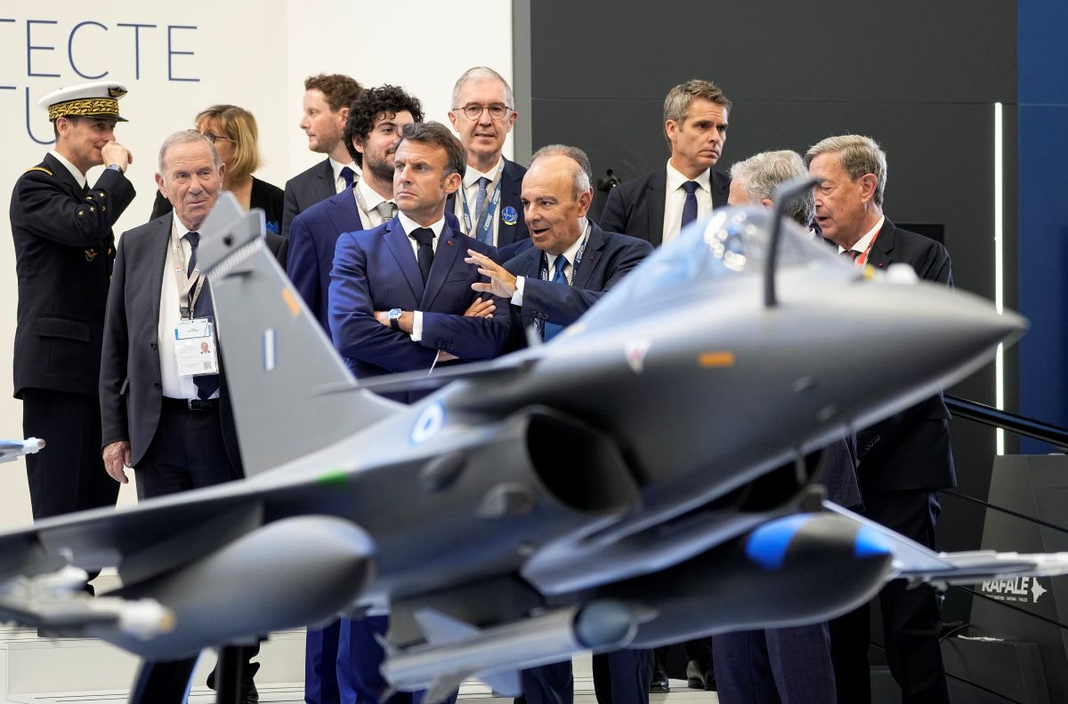 Macron speaks with Dassault Aviation's CEO Eric Trappier Macron speaks with Dassault Aviation's CEO Eric Trappier